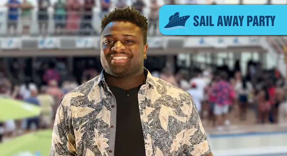 Smiling man in a tropical shirt at a crowded cruise-party with a blue Sail Away Party banner in the corner. | Escape Code | Branson, Missouri Escape Room